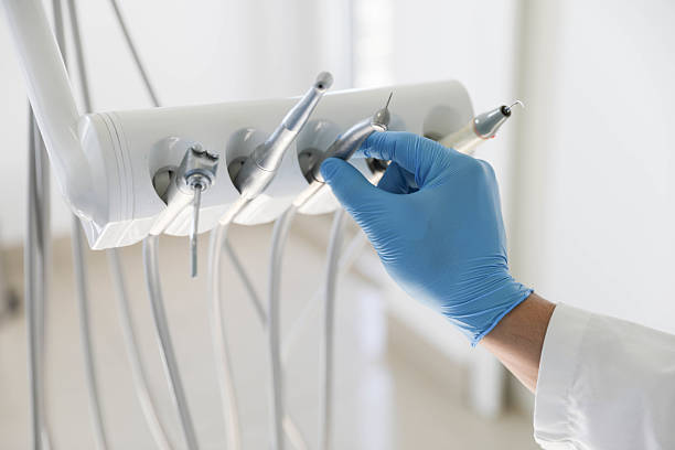 Professional Emergency Dentist technician working in Monroe, MI